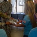 Personnel stationed at Camp Atterbury welcome the family of fallen service member