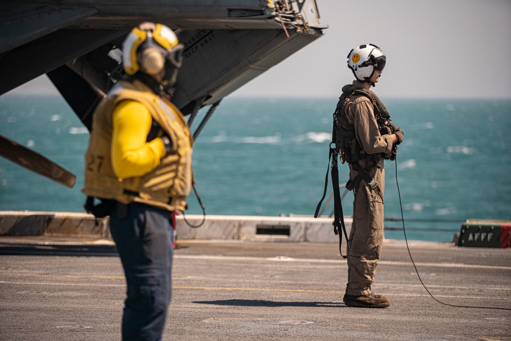 CH-53E Super Stallion maintenance aboard USS Portland