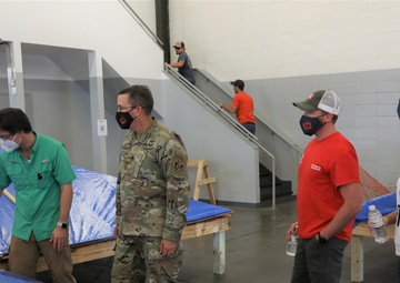 COL Kevin Golinghorst visits Blue Roof contractor warehouses