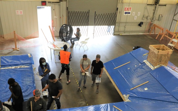 COL Kevin Golinghorst visits Blue Roof contractor warehouses