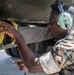 Marines participate in hot pit refueling with 18th Wing Airmen