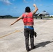 Marines participate in hot pit refueling with 18th Wing Airmen