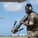 Marines participate in hot pit refueling with 18th Wing Airmen
