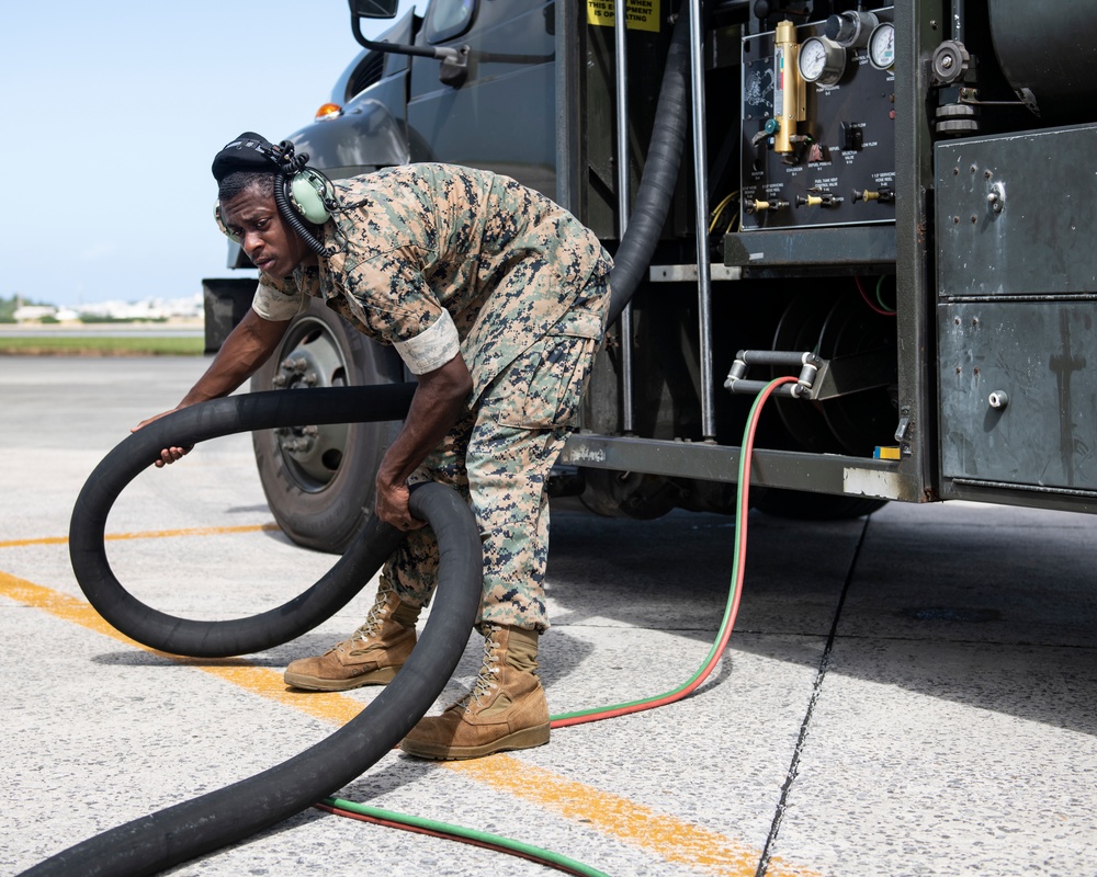 Marines participate in hot pit refueling with 18th Wing Airmen