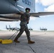 Marines participate in hot pit refueling with 18th Wing Airmen