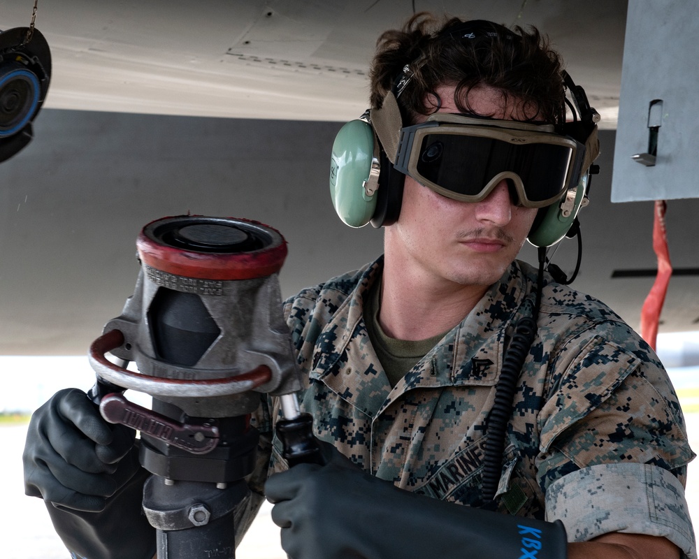 Marines participate in hot pit refueling with 18th Wing Airmen