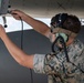 Marines participate in hot pit refueling with 18th Wing Airmen