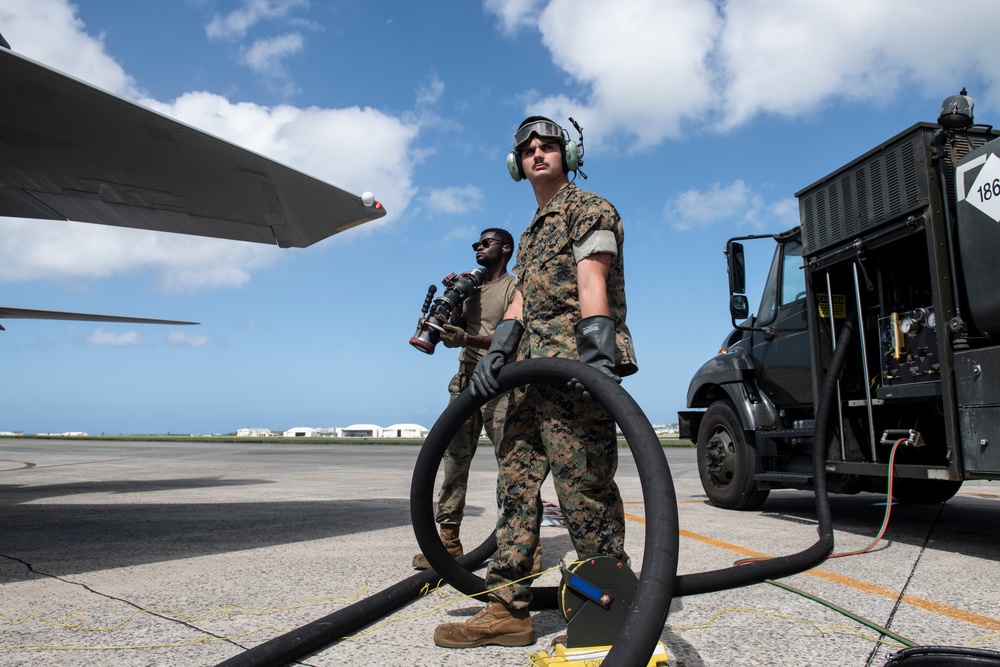 Marines participate in hot pit refueling with 18th Wing Airmen