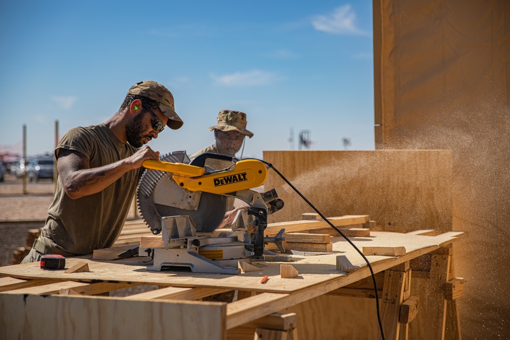 Task Force Holloman builds flooring for prayer tents