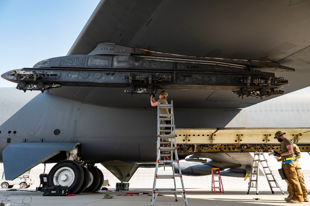 Air Force Weapons Load Crew Members Load Munitions