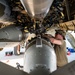 Air Force Weapons Load Crew Members Load Munitions