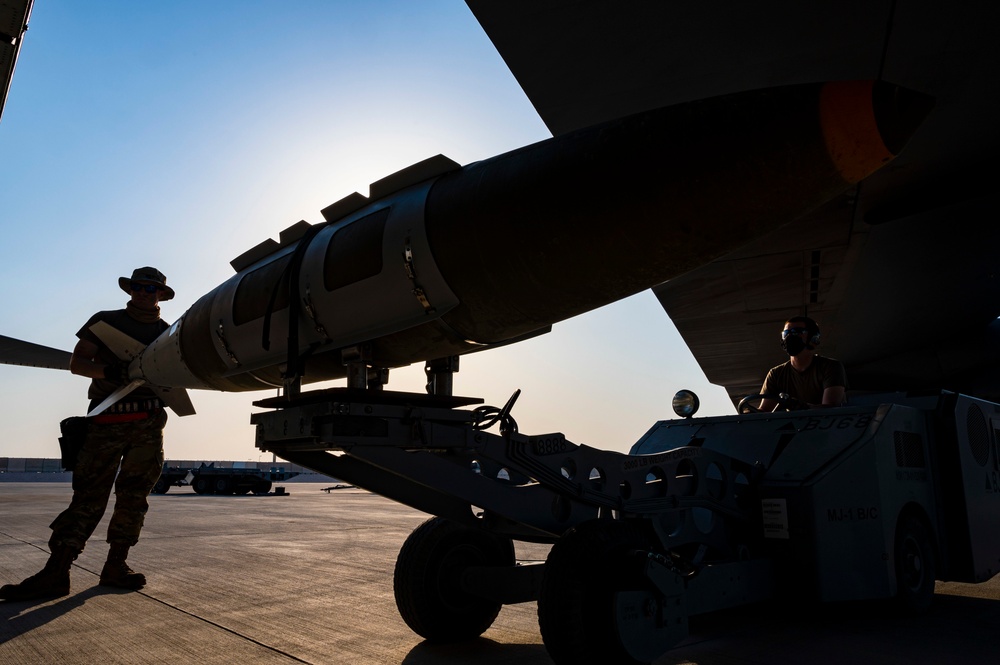 Air Force Weapons Load Crew Members Load Munitions