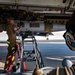 Air Force Weapons Load Crew Members Load Munitions