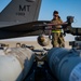 Air Force Weapons Load Crew Members Load Munitions