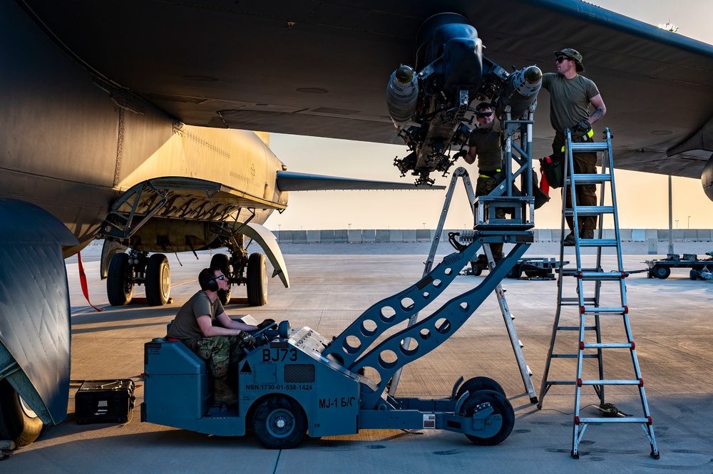 Air Force Weapons Load Crew Members Load Munitions