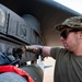 Air Force Weapons Load Crew Members Load Munitions