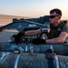 Air Force Weapons Load Crew Members Load Munitions