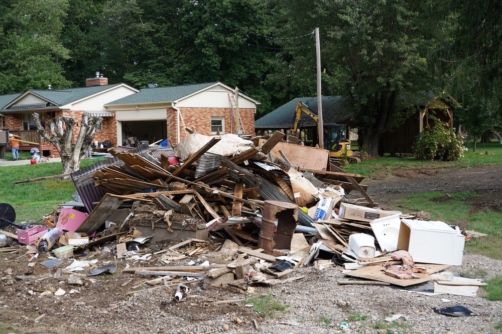 Debris Removed From Flood Damaged House