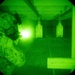 A 934th Security Forces Squadron Airman fires his M-4 during a simulated night fire training