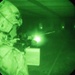 A 934th Security Forces Squadron Airman fires his M-4 during a simulated night fire training