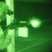 A 934th Security Forces Squadron Airman fires his M-4 during a simulated night fire training