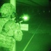 A 934th Security Forces Squadron Airman fires his M-4 during a simulated night fire training