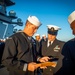 GHWB Sailors Conduct a Service Dress Blue Uniform Inspection