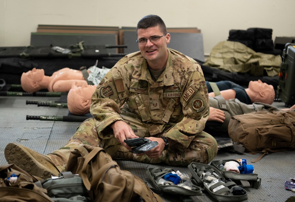 60th AES Airman assists during in-flight medical emergency