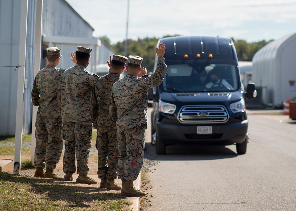 U.S Marines Wave Goodbye to an Afghan Family Departing TF Quantico