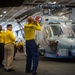 USS Carl Vinson (CVN70) Sailors Work in Hangar Bay