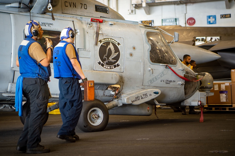 USS Carl Vinson (CVN70) Sailors Work in Hangar Bay