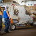 USS Carl Vinson (CVN70) Sailors Work in Hangar Bay