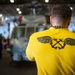 USS Carl Vinson (CVN70) Sailors Work in Hangar Bay