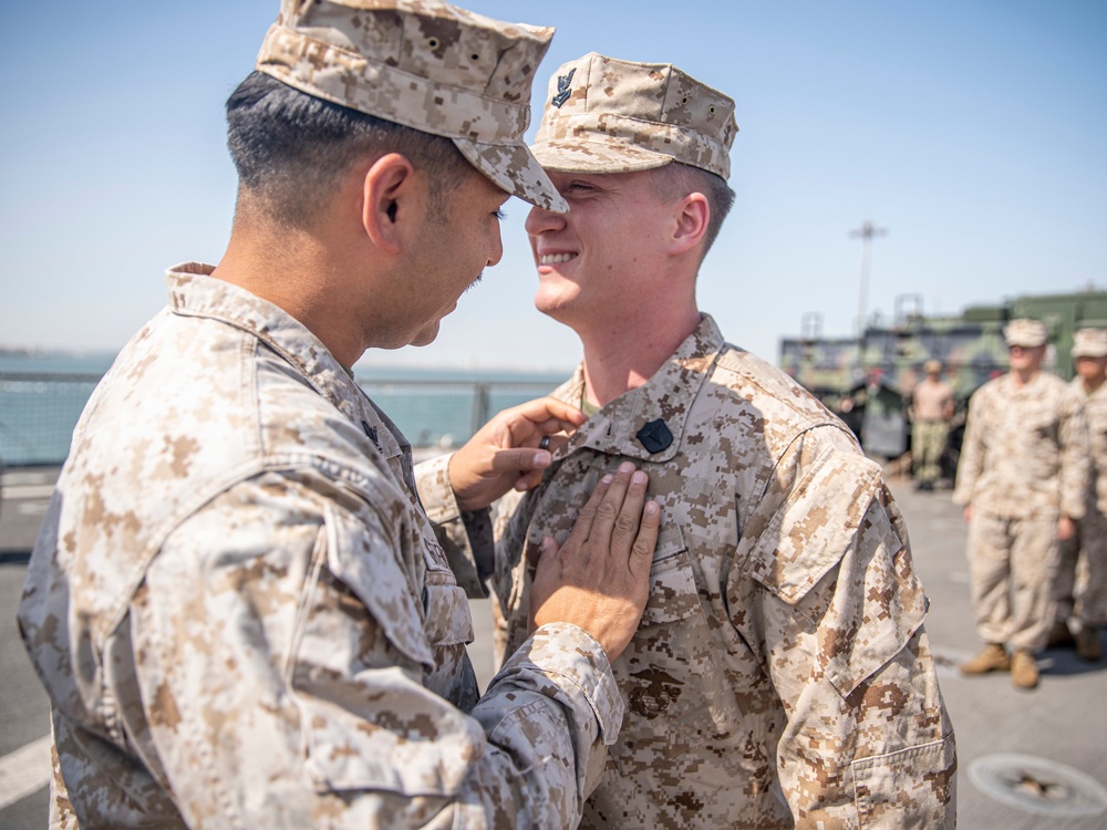 11th MEU Sailors receive FMF pin aboard Pearl Harbor