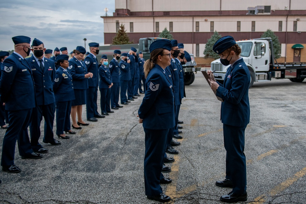 Airmen conduct open ranks inspection