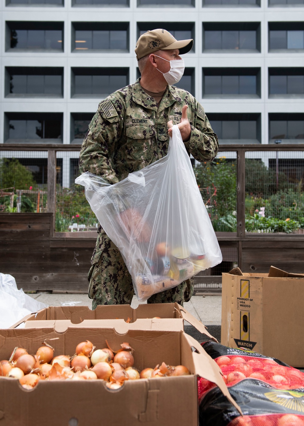 McCain Sailors package food during a community service project at SF-Marin Food Bank