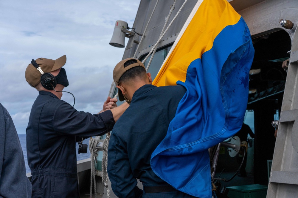 USS Jackson (LCS 6) Sailors Haul Down Kilo Flag