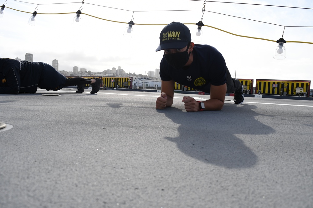 Navy's Newest Sailors PT on the Navy's Newst Ship