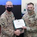 Chief Warrant Officer 4 Scott O. Harned receives combat award