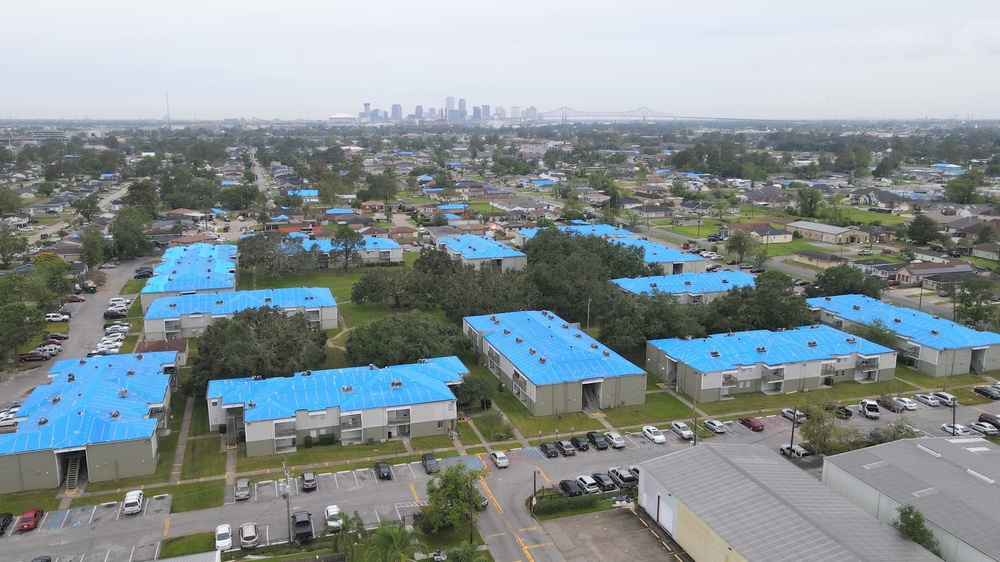 Multi-family housing units with U.S. Army Corps of Engineers blue roofs following Hurricane Ida