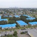 Multi-family housing units with U.S. Army Corps of Engineers blue roofs following Hurricane Ida