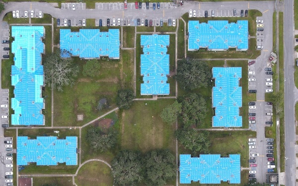 Multi-family housing units with U.S. Army Corps of Engineers blue roofs following Hurricane Ida