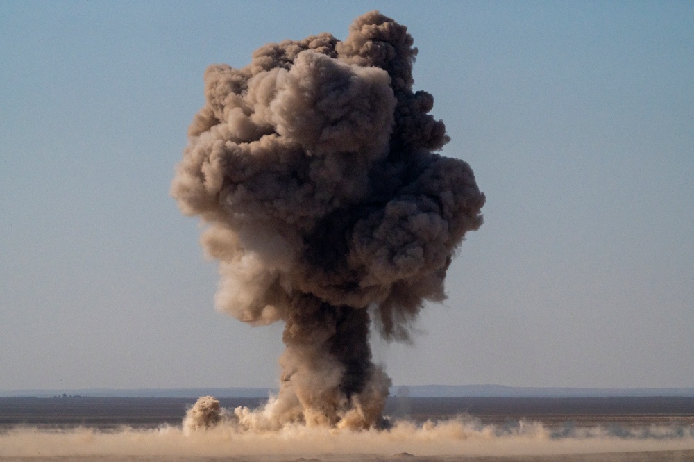 F-15E Strike Eagles offload bombs