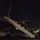 Evacuees board first outbound flight after three-week pause