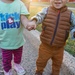 Afghan children hold hands in Liberty Village
