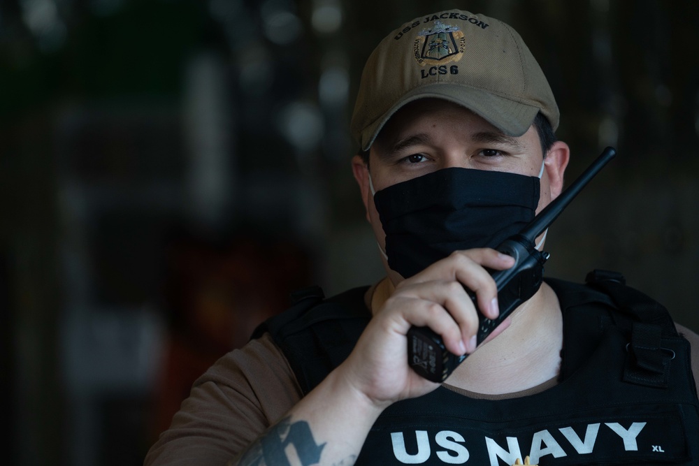 USS Jackson (LCS 6) Sailor Stands Watch