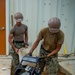 U.S. Navy Seabees assigned to NMCB-5 prepare for concrete placement