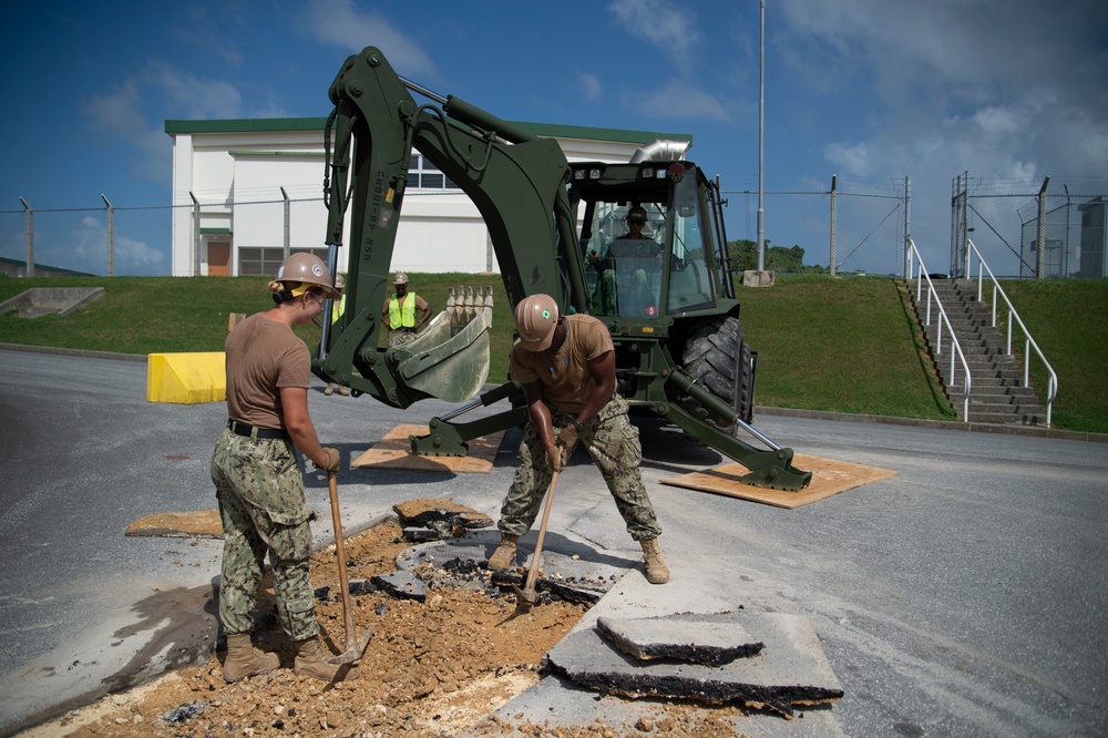 U.S. Navy Seabees assigned to NMCB-5 prepare for concrete placement