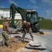 U.S. Navy Seabees assigned to NMCB-5 prepare for concrete placement