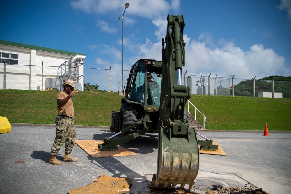 U.S. Navy Seabees assigned to NMCB-5 prepare for concrete placement